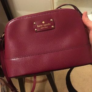Maroon-colored Kate Spade crossbody purse